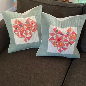 Pair of quilted heart pillow covers